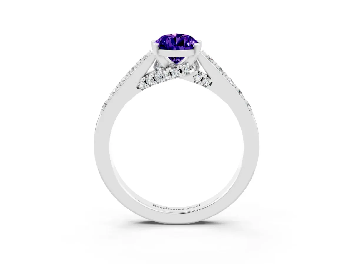 Pear Cut Tanzanite Solitaire Ring with Crossover Gallery and Round Pavé Band Silver