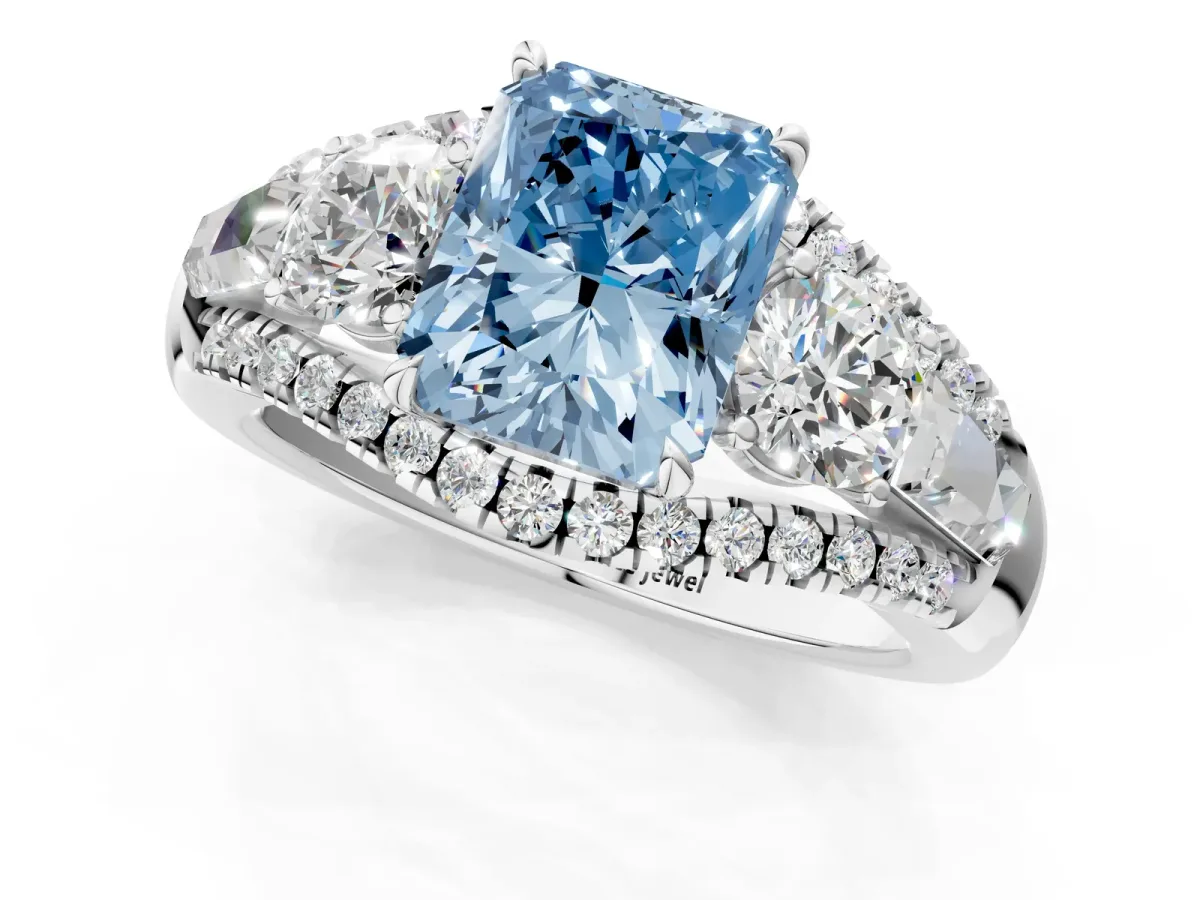 Fancy Blue Three-Stone Radiant Cut Diamond Engagement Ring with Pave Band and Prong Setting Platinum