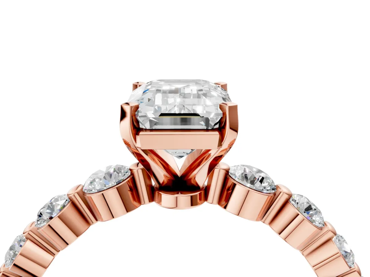 Emerald Cut Solitaire Diamond Ring with Pave Band and Four-Prong Setting Rose gold