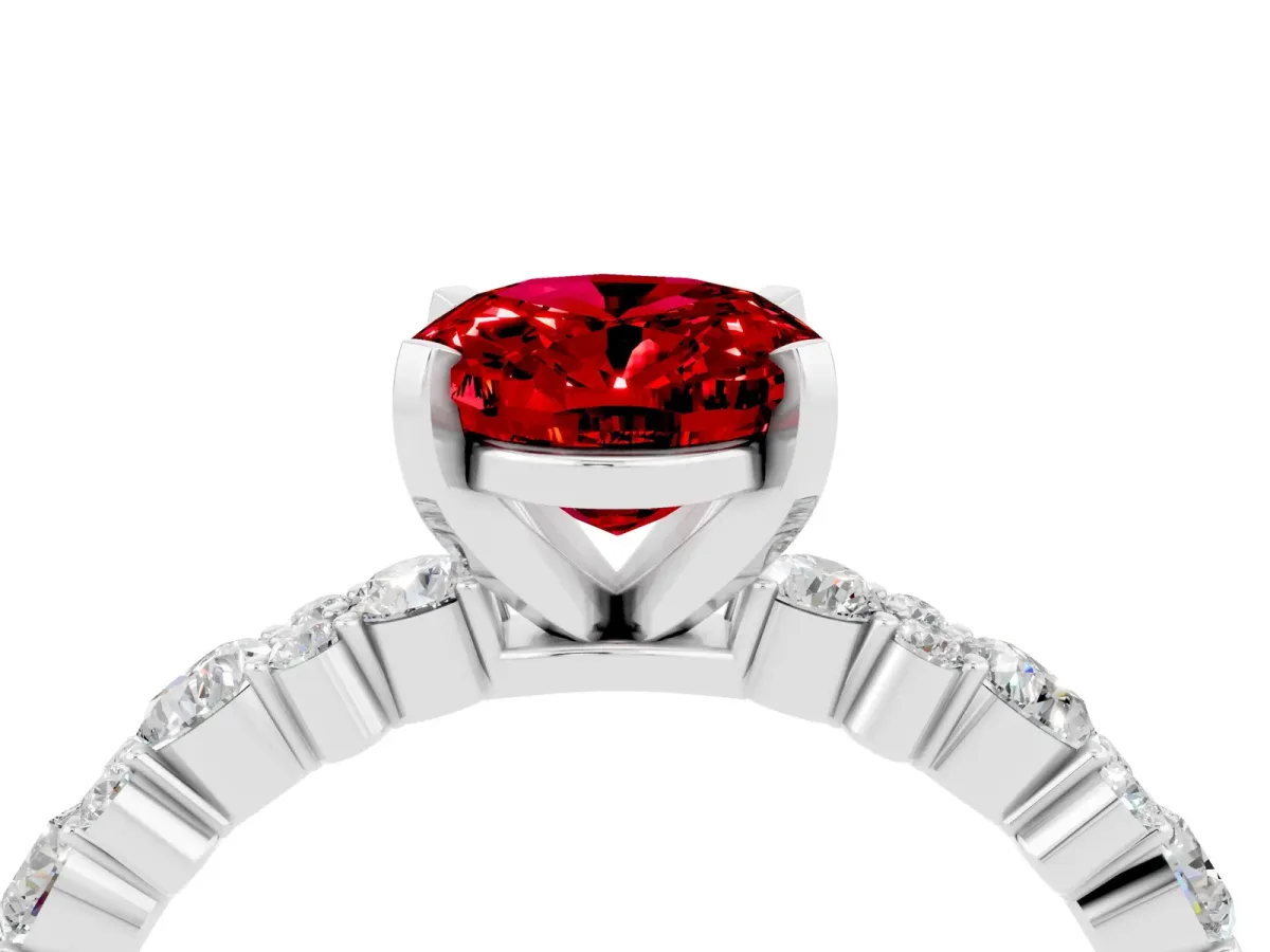 Oval Cut Ruby Side Stone Solitaire Ring with Round and Four-Prong Setting Platinum
