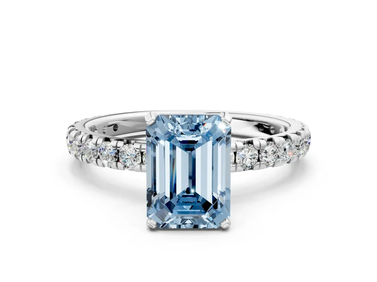 Fancy Blue Emerald Cut Diamond Pavé Solitaire Ring with Round Band and Prong Setting White gold