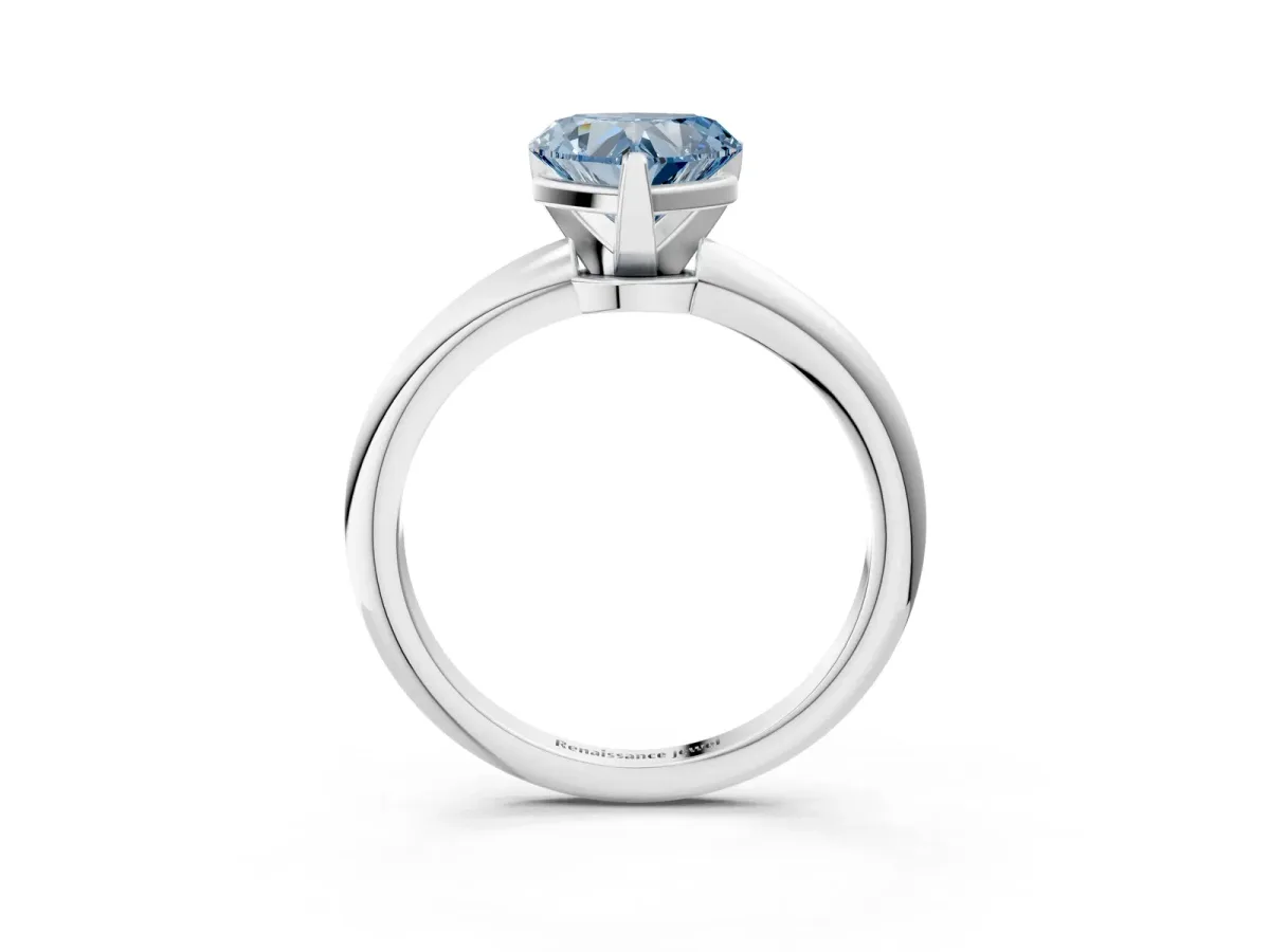 Fancy Blue Heart Cut Diamond Solitaire Ring with Six-Prong Setting and Classic Band Silver