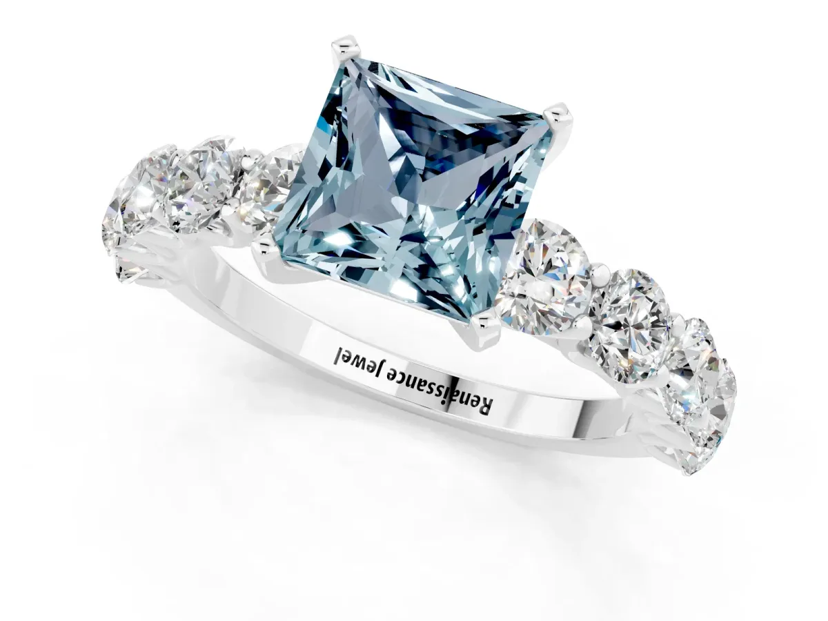 Princess Cut Aquamarine Prong Setting with Side Stones on a Pave Band Silver