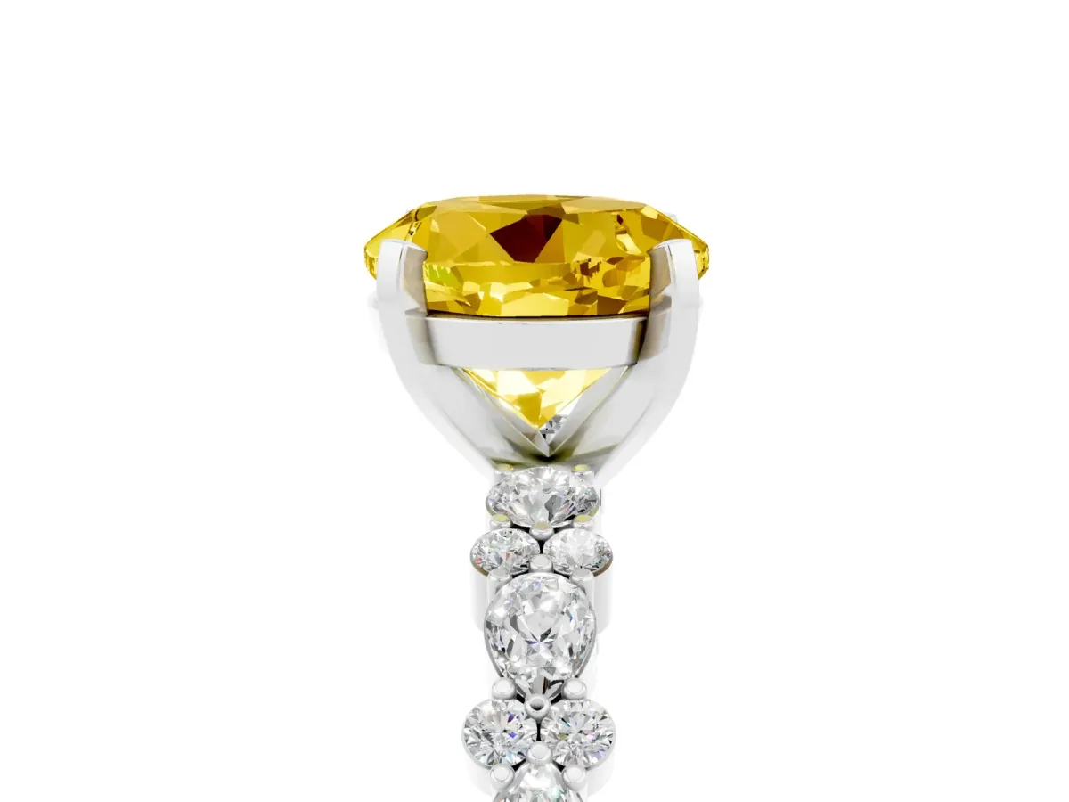 Round Cut Yellow Sapphire Side Stone Solitaire Ring with Round and Four-Prong Setting White gold
