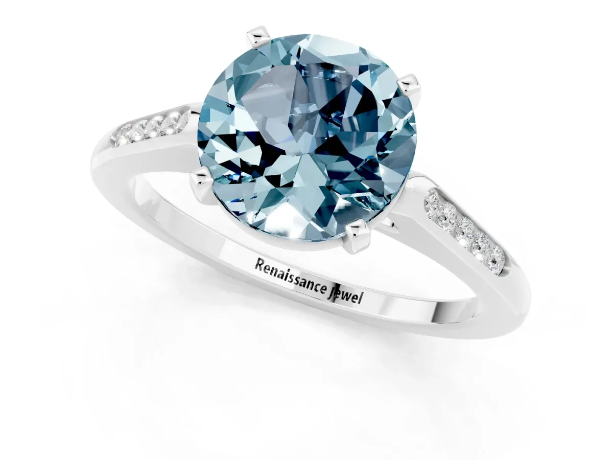 Round Cut Aquamarine Solitaire Ring with Channel Set Round Band and Prong Setting Silver