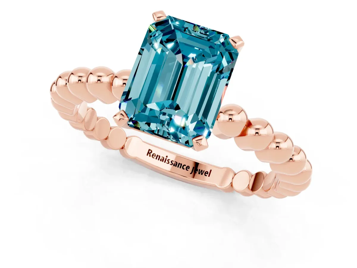 Emerald Cut Blue Topaz Solitaire Ring with Beaded Band and Prong Setting Rose gold