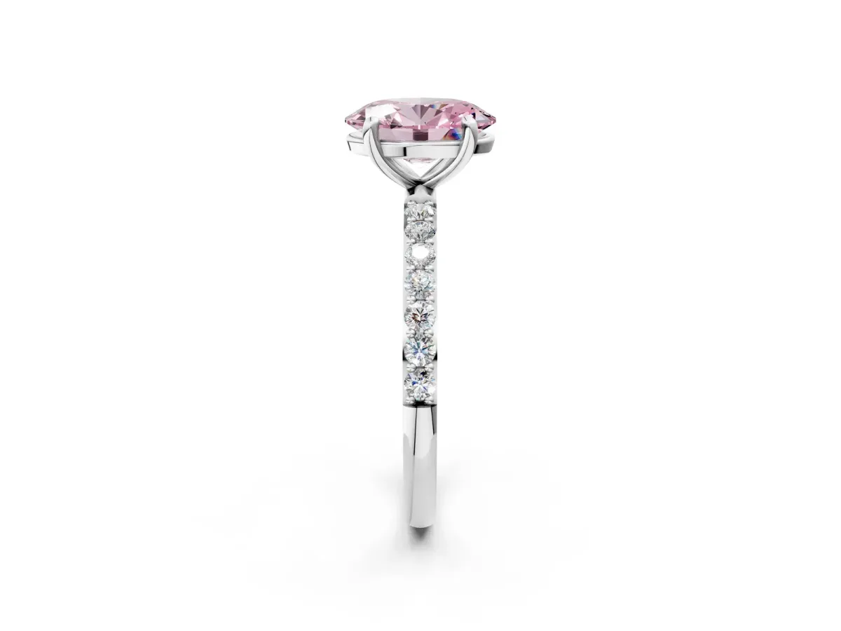 Fancy Pink Oval Cut Diamond Solitaire Ring with Round Pavé Band and Prong Setting Silver
