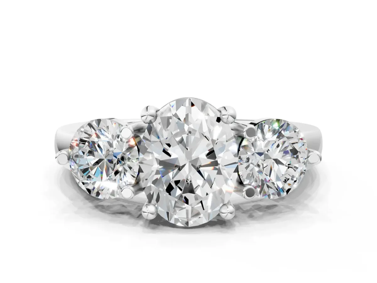 Three-Stone Oval Cut Brilliant Cut Solitaire Ring with Prong Setting on a Classic Band White gold