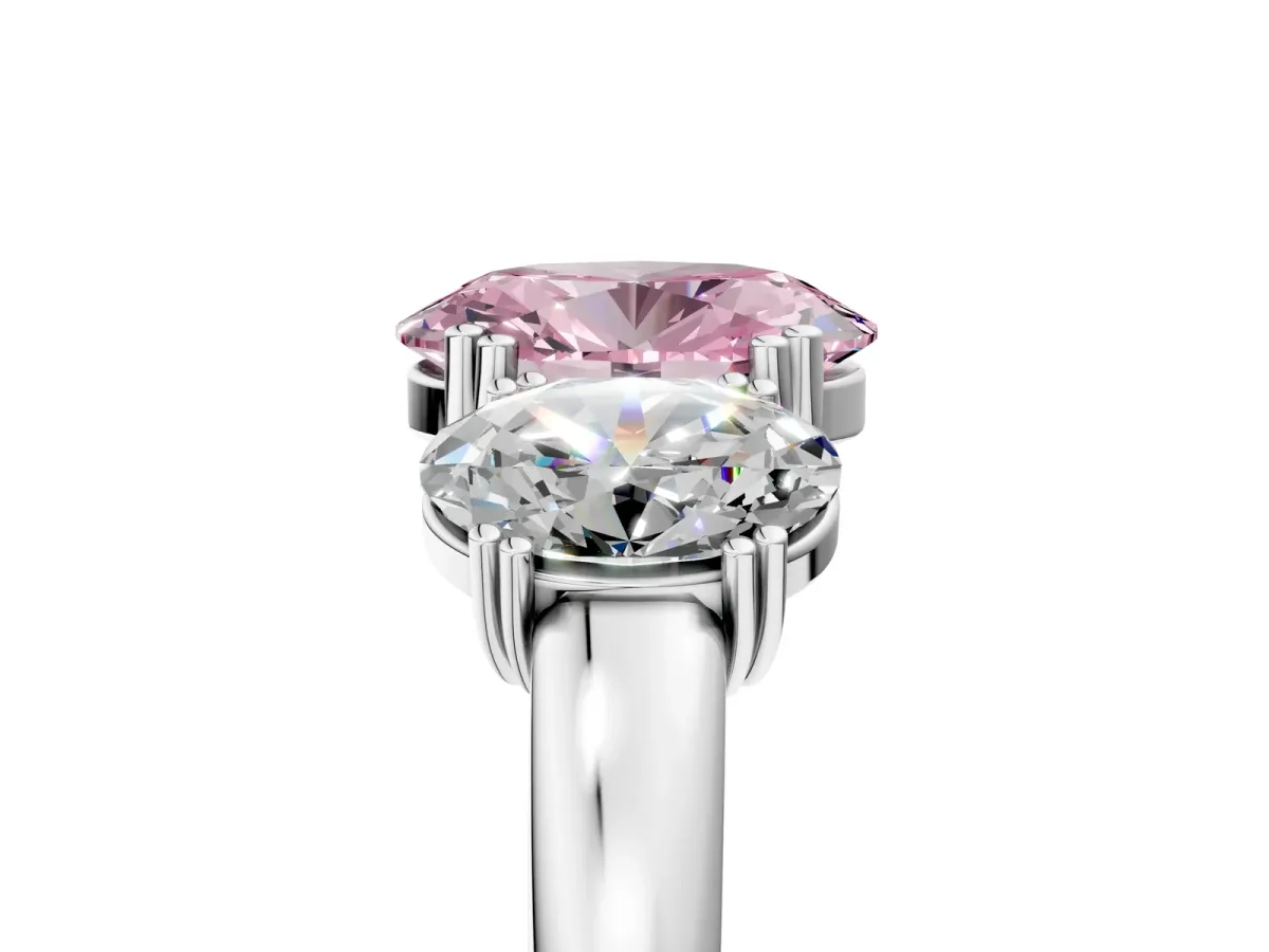 Fancy Pink Three-Stone Oval Cut Cut Diamond Ring with Channel Set Band and Four-Prong Setting Silver