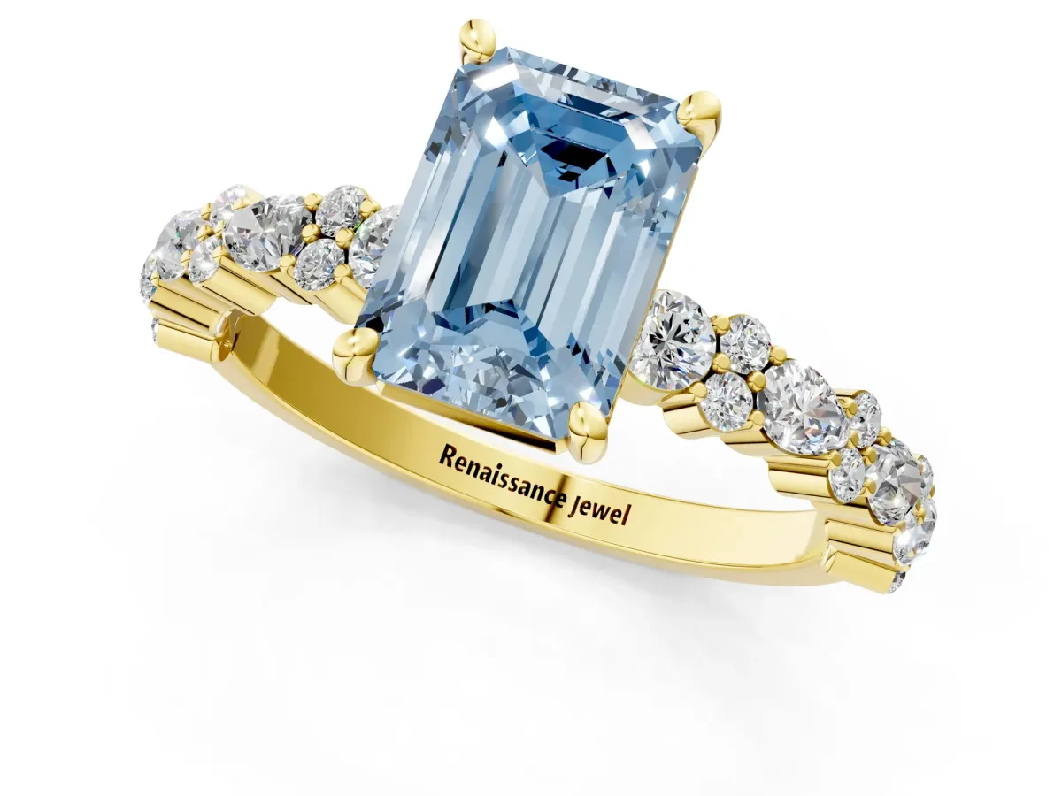 Fancy Blue Emerald Cut Diamond Side Stone Solitaire Ring with Round and Four-Prong Setting Yellow gold