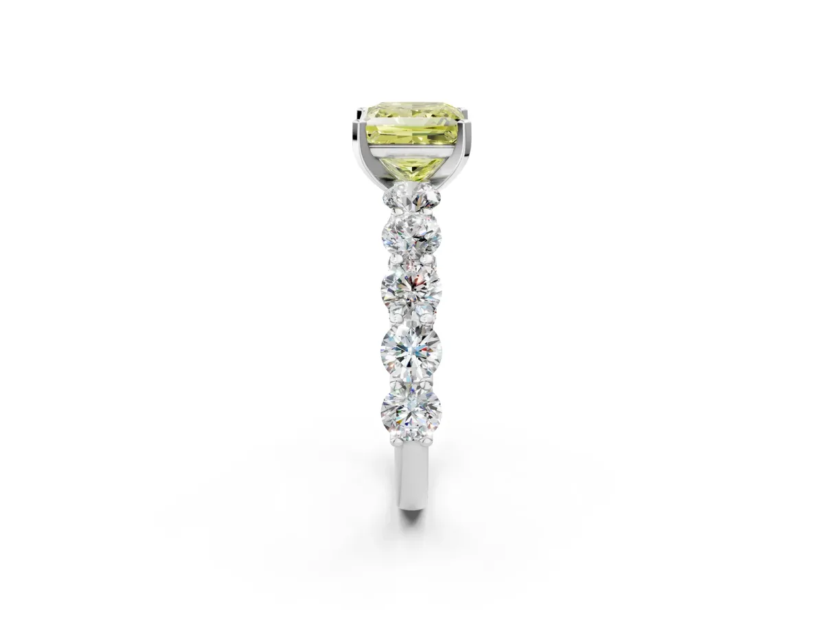 Fancy Yellow Princess Cut Diamond Prong Setting with Side Stones on a Pave Band Silver