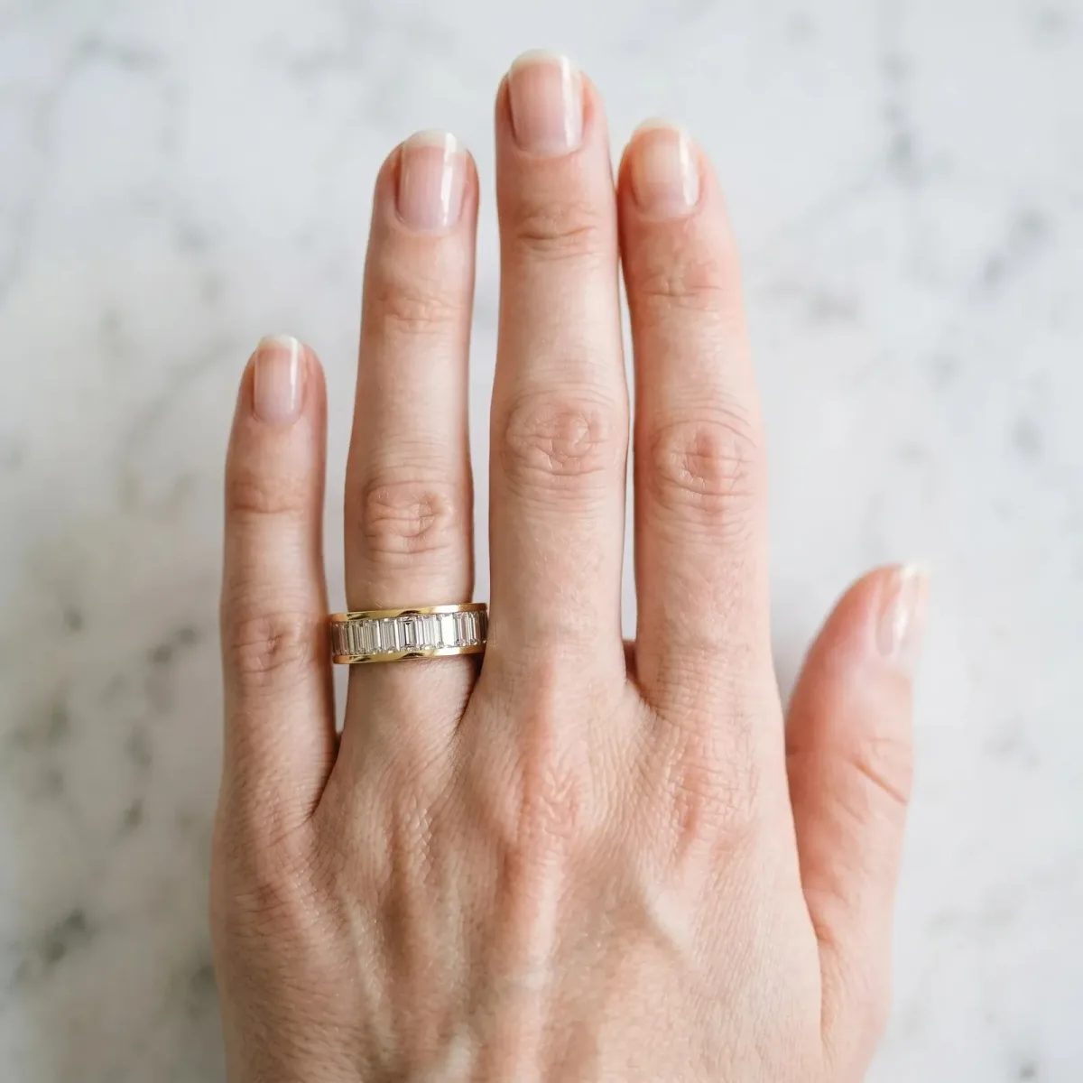 baguette Cut eternity band with channel set Yellow gold
