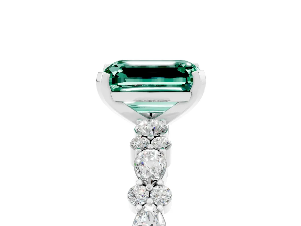 Emerald Cut Green Sapphire Side Stone Solitaire Ring with Round and Four-Prong Setting White gold