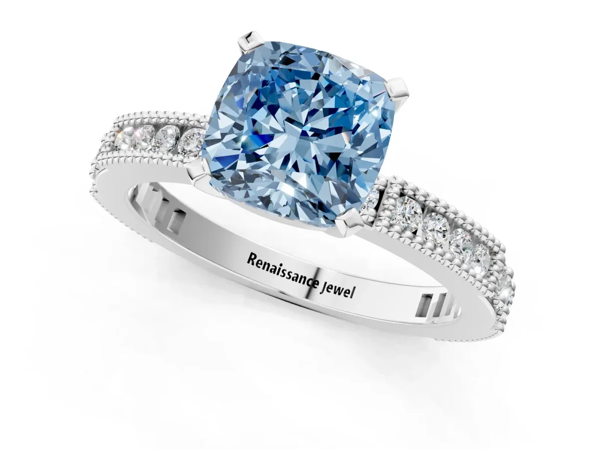 Fancy Blue Cushion Cut Solitaire with Pavé Band and Four-Prong Setting Silver