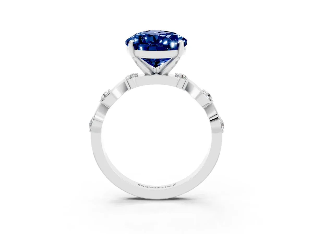 Pear Cut Blue Sapphire Solitaire Twisted Band with Round Accents and Prong Setting Silver