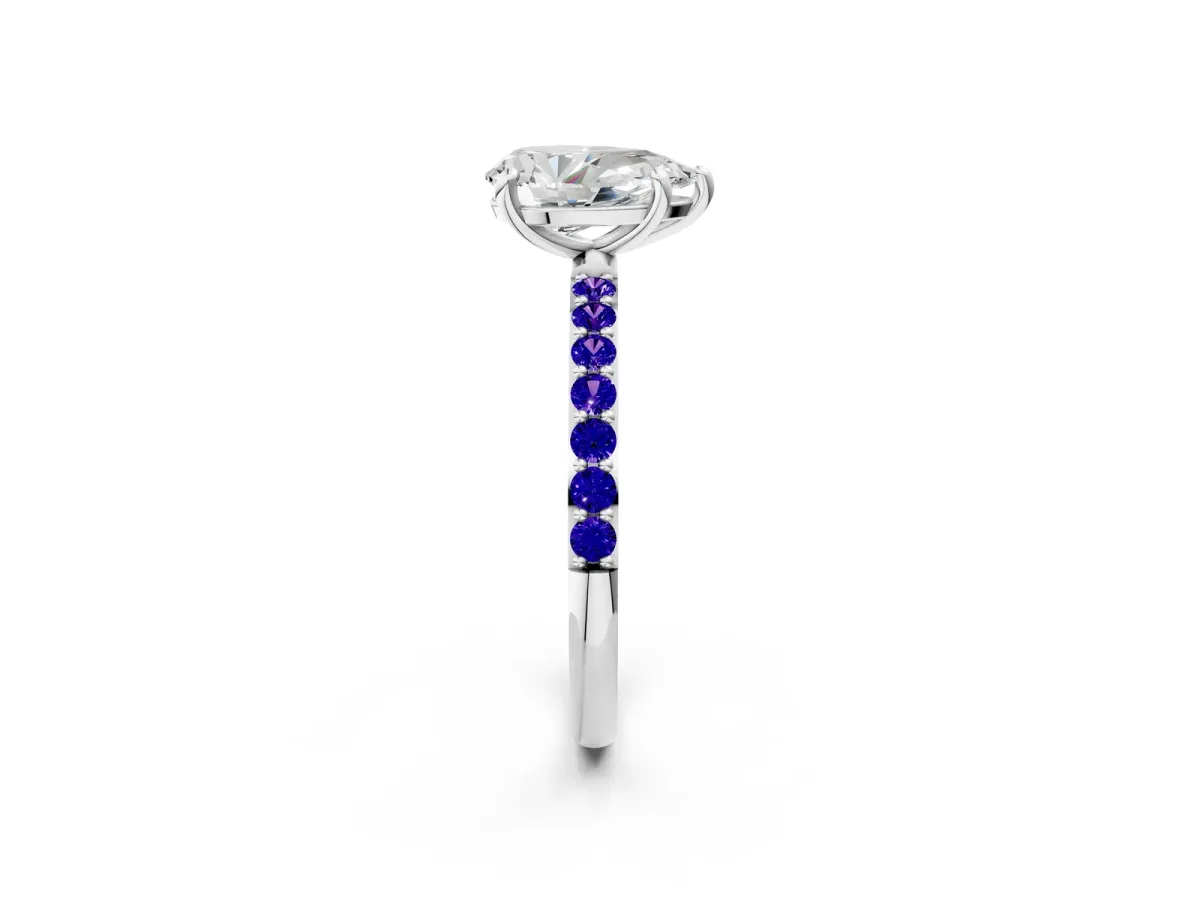 Pear Cut Diamond Solitaire Ring with Round Tanzanite Pavé Band and Prong Setting Silver