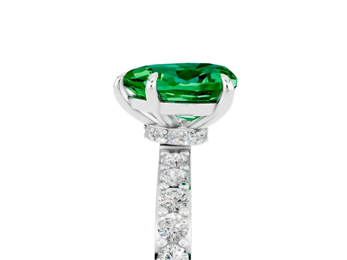 Heart Cut Emerald Solitaire Engagement Ring with Pavé Band and Four-Prong Setting Silver