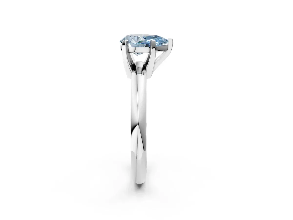 Fancy Blue Pear Cut Diamond Solitaire Engagement Ring with Round Band and Four-Prong Setting Silver