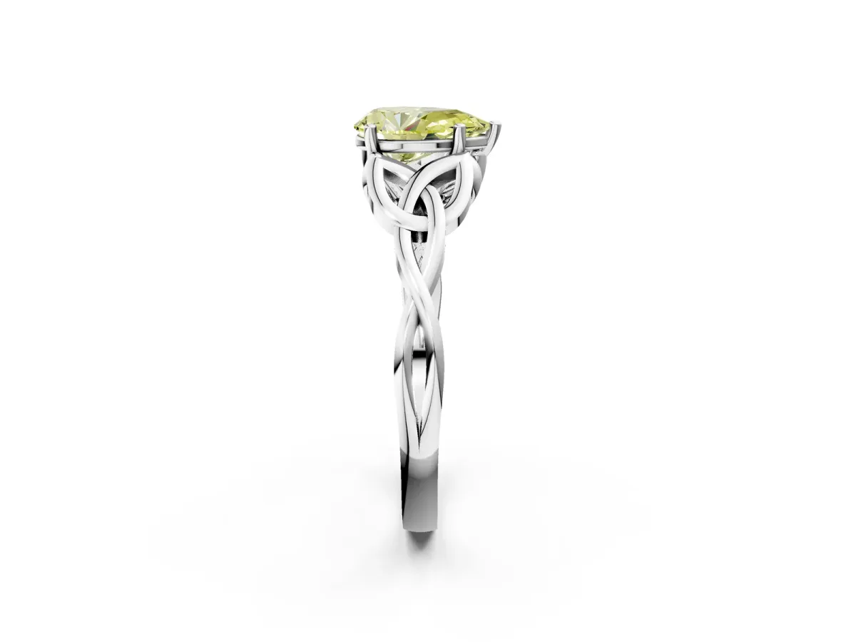 Fancy Yellow Pear Cut Diamond Solitaire Engagement Ring with Celtic Knot Band and Four-Prong Setting Silver