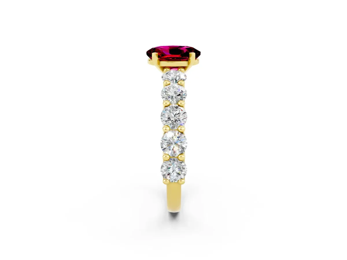 Oval Cut Garnet Prong Setting with Side Stones on a Pave Band Yellow gold