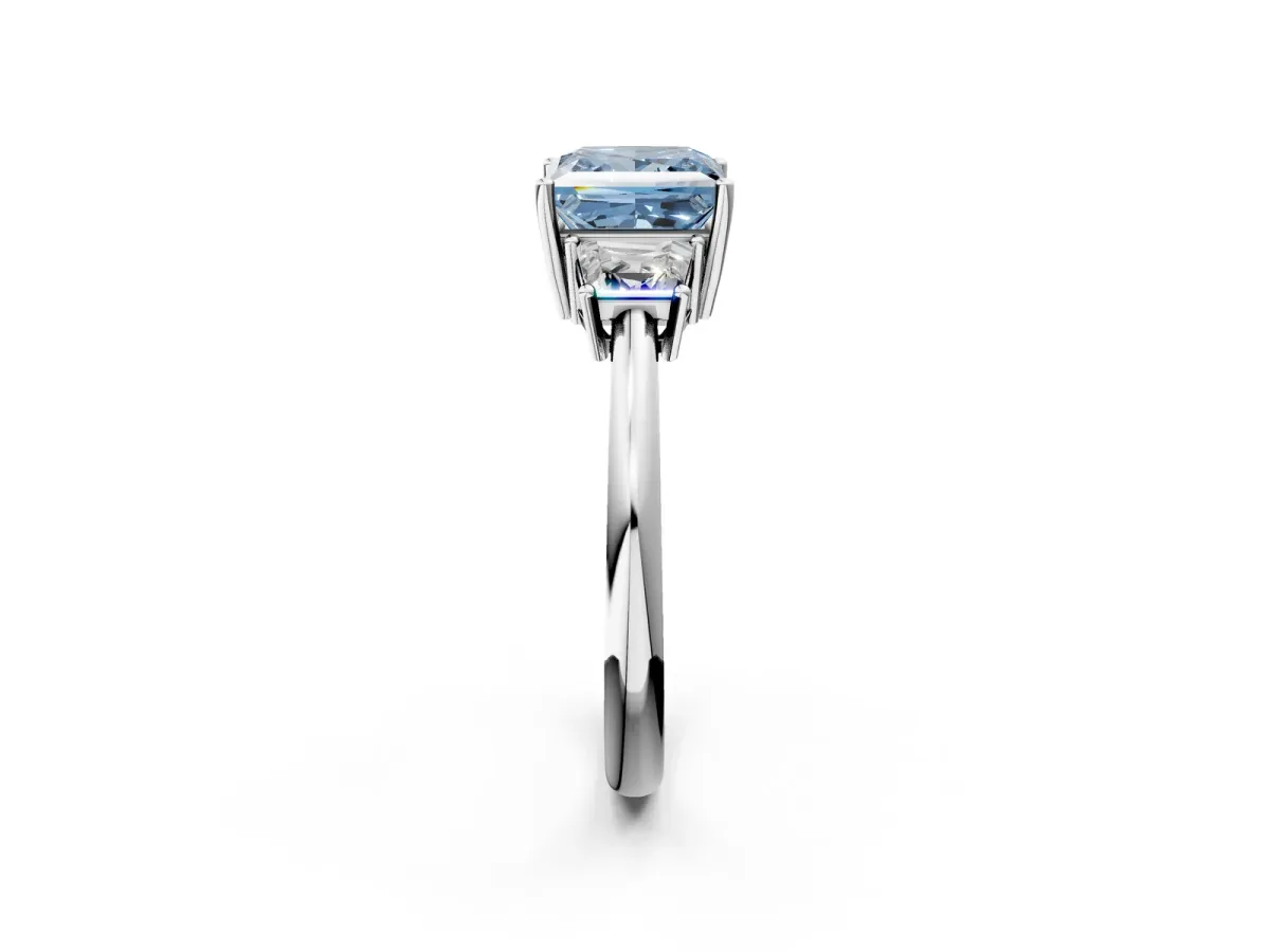 Fancy Blue Princess Cut Diamond Three-Stone Ring with Trapezoid Side Stones and Prong Setting Platinum