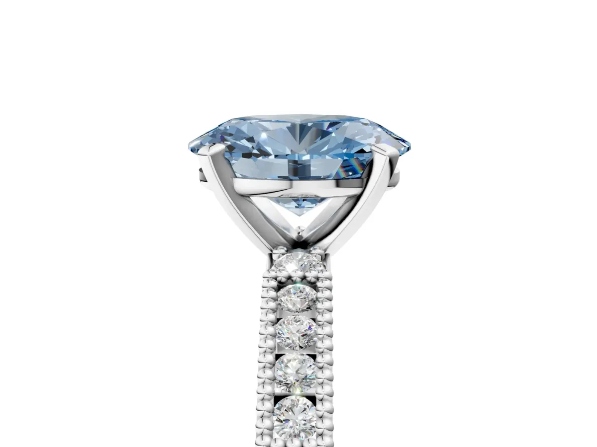 Fancy Blue Oval Cut Solitaire with Pavé Band and Four-Prong Setting White gold