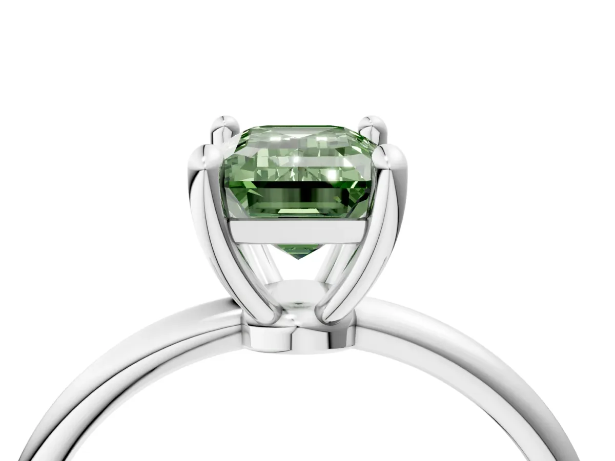 Fancy Green Emerald Cut Solitaire Diamond Ring with 4-Prong Setting on a Classic Band Silver