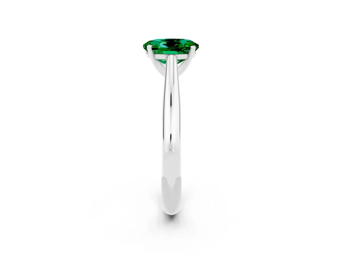 Oval Cut Emerald Solitaire Engagement Ring with Cathedral Setting and Four-Prong Mount White gold