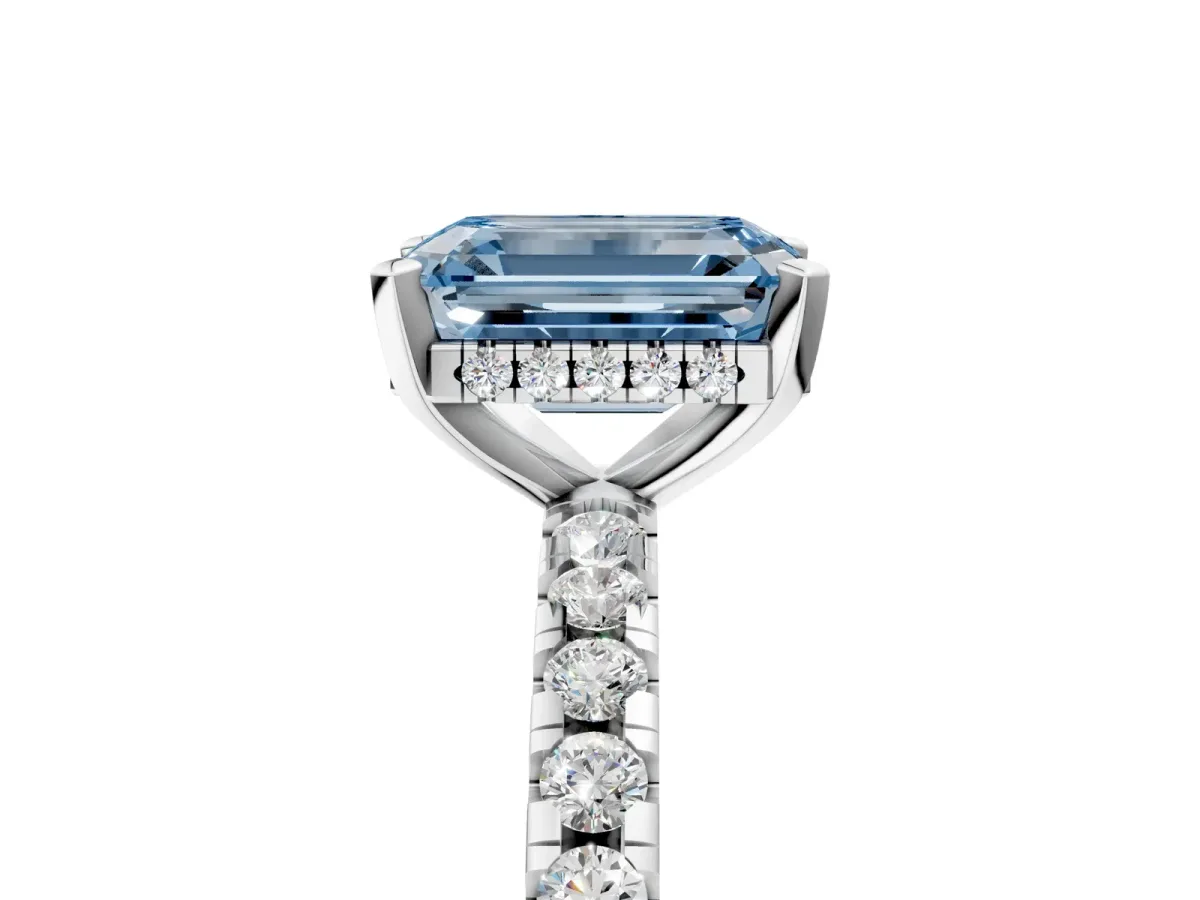 Fancy Blue Emerald Cut Diamond Solitaire Ring with Round Pavé Band and Four-Prong Setting Silver