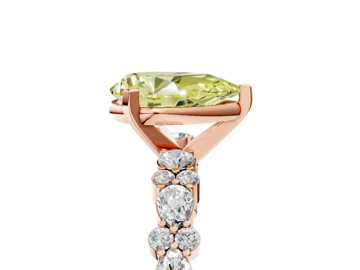 Fancy Yellow Pear Cut Diamond Side Stone Solitaire Ring with Round and Four-Prong Setting Rose gold