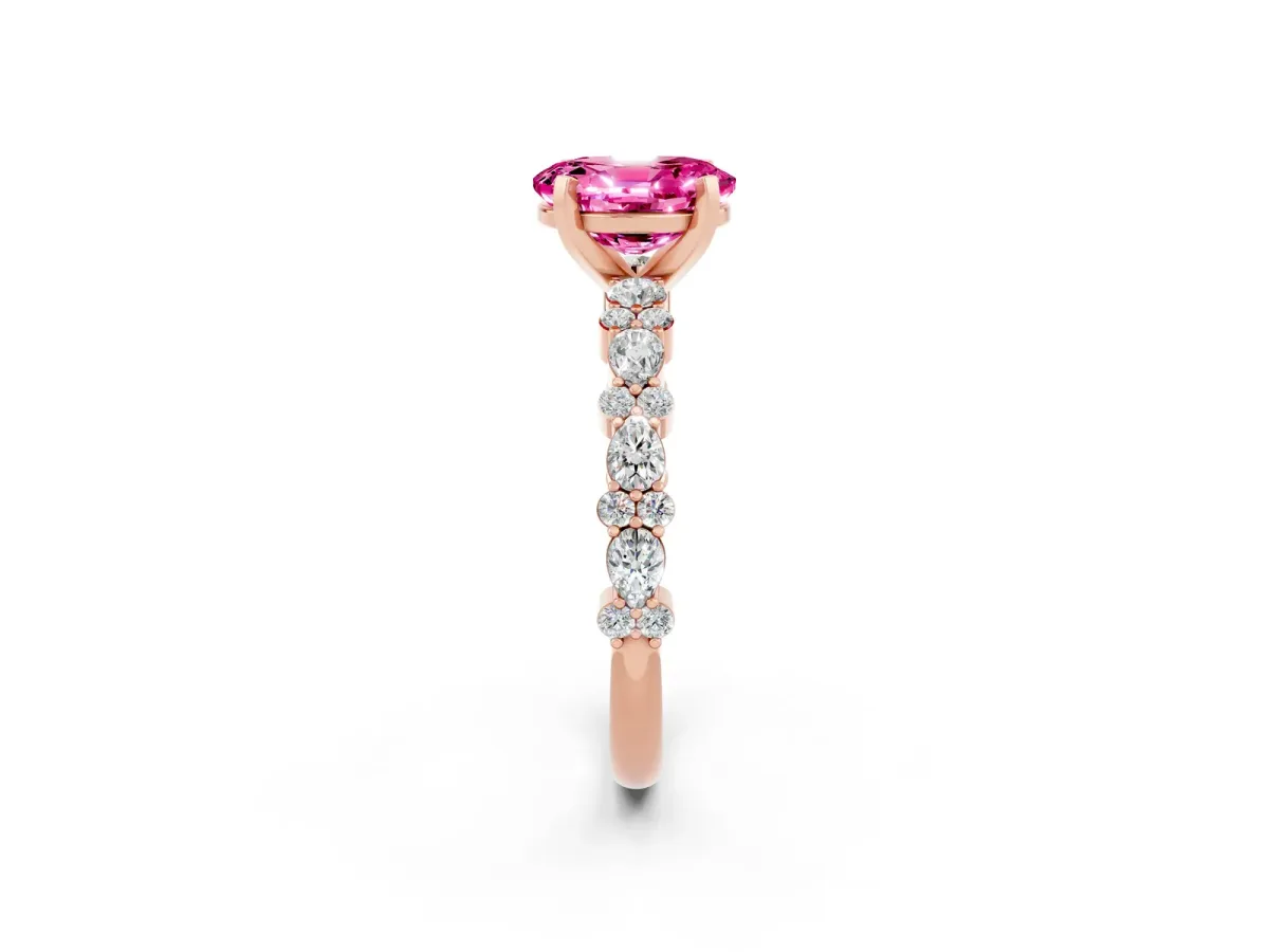 Oval Cut Pink Sapphire Side Stone Solitaire Ring with Round and Four-Prong Setting Rose gold