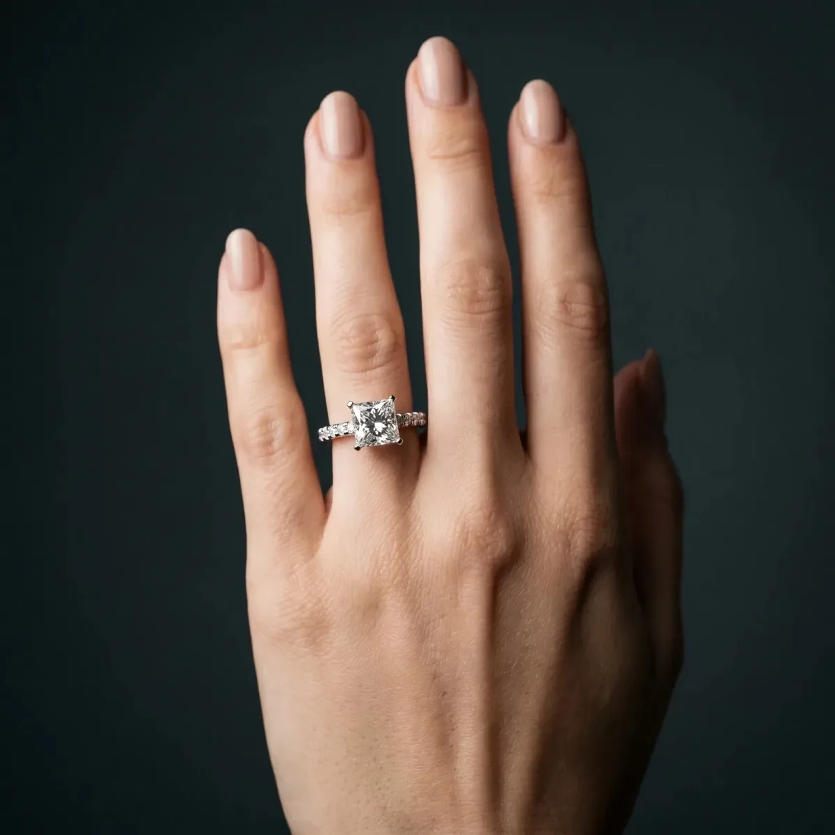 Princess Cut Solitaire Diamond with Pavé Band and Four-Prong Setting Platinum