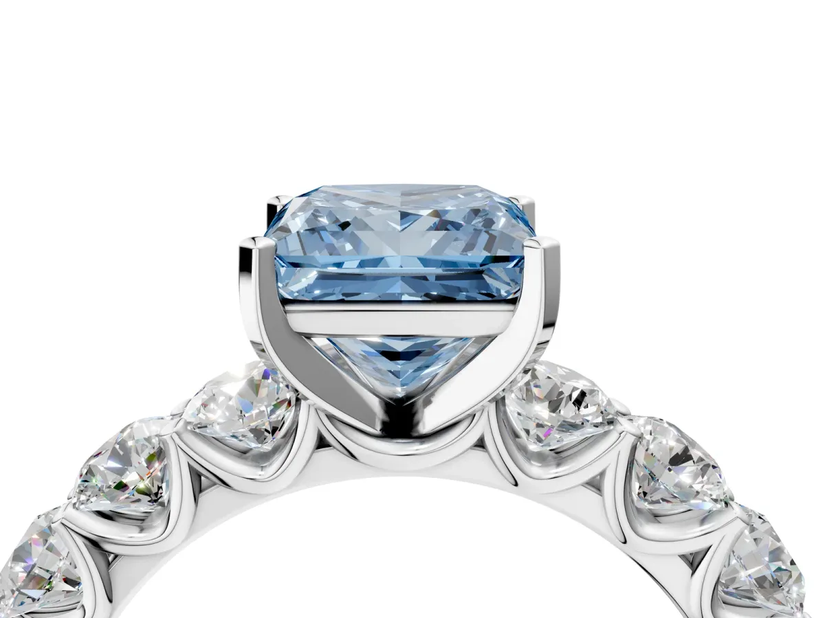 Fancy Blue Princess Cut Diamond Prong Setting with Side Stones on a Pave Band Silver
