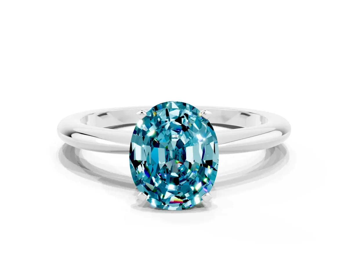 Oval Cut Blue Topaz Solitaire Ring with Six-Prong Setting and Classic Band Silver