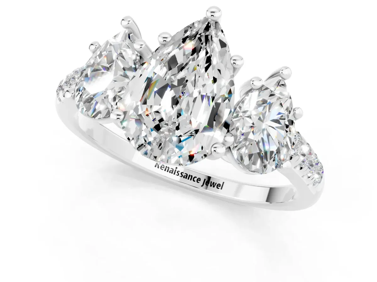 Three-Stone Pear Cut Moissanite Ring with Round Pavé Band and Prong Setting Silver