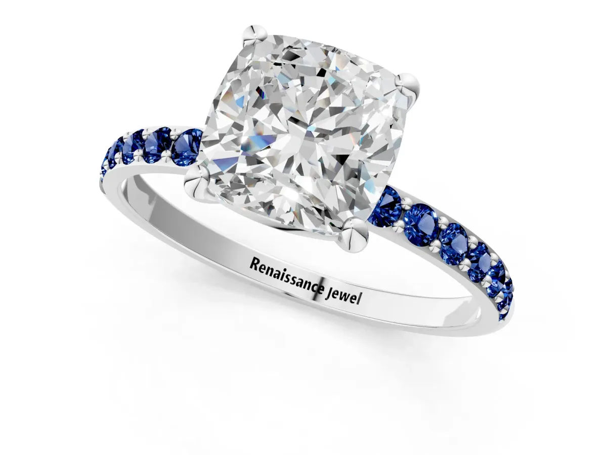 Cushion Cut Diamond Solitaire Ring with Round Blue Sapphire Pavé Band and Prong Setting Silver
