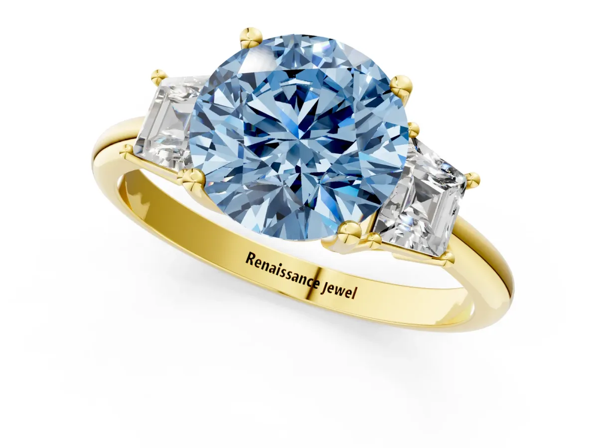 Fancy Blue Round Cut Diamond Three-Stone Ring with Trapezoid Side Stones and Prong Setting Yellow gold