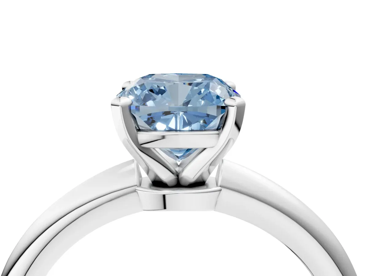 Fancy Blue Cushion Cut Diamond Solitaire Ring with Six-Prong Setting and Classic Band Silver