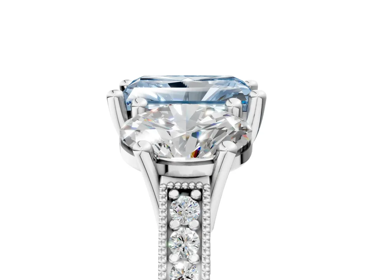 Fancy Blue Three-Stone Radiant Cut Diamond Milgrain Pave Band with Prong Setting Platinum