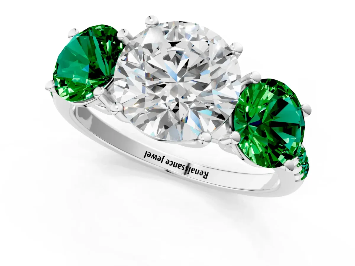 Three-Stone Round Cut Diamond Ring with Round Emerald Pavé Band and Prong Setting Platinum
