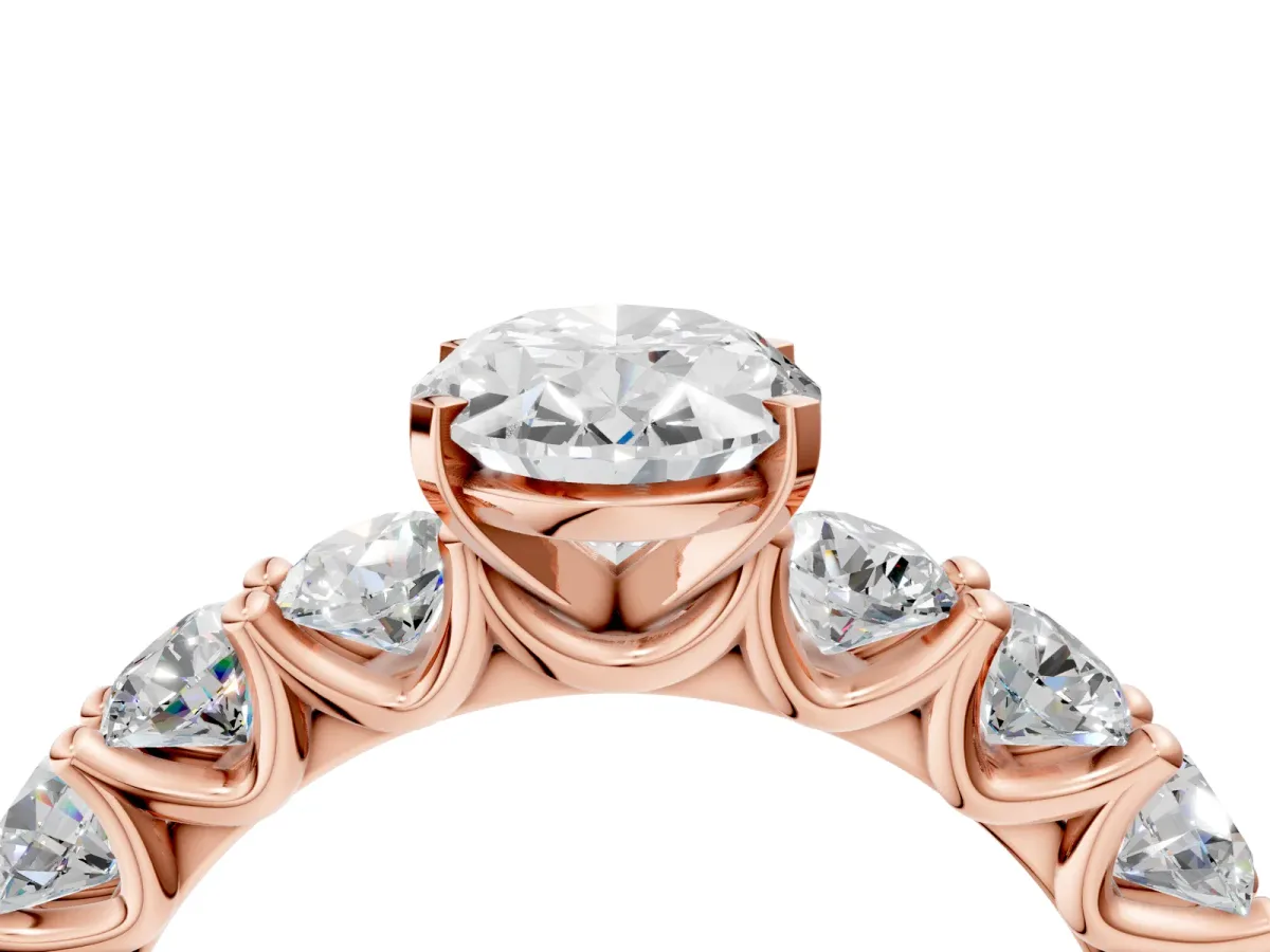 Oval Cut Diamond Prong Setting with Side Stones on a Pave Band Rose gold