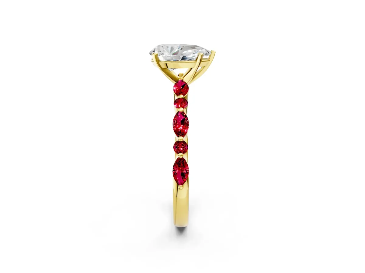 Pear Cut Diamond Ring with Marquise and Round Ruby Side Stones and Four-Prong Setting Yellow gold