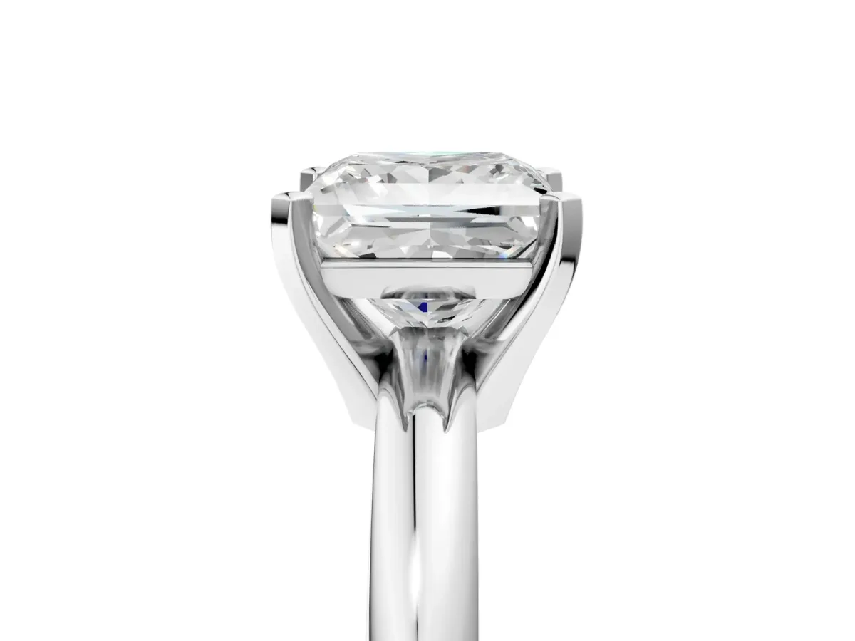 Princess Cut Diamond Solitaire Engagement Ring with Round Band and Four-Prong Setting Silver
