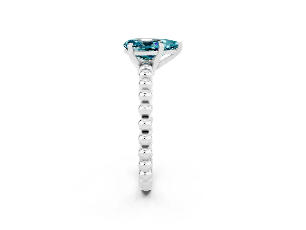 Pear Cut Blue Topaz Solitaire Ring with Beaded Band and Prong Setting Silver