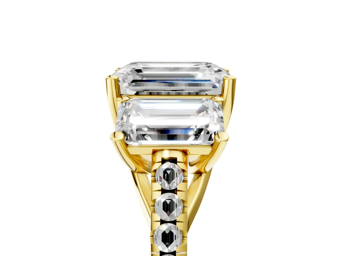 Three-Stone Emerald Cut Diamond Ring with Round Pavé Band and Prong Setting Yellow gold