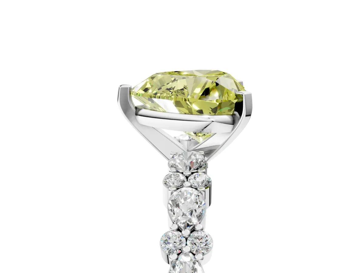 Fancy Yellow Heart Cut Diamond Side Stone Solitaire Ring with Round and Four-Prong Setting Platinum
