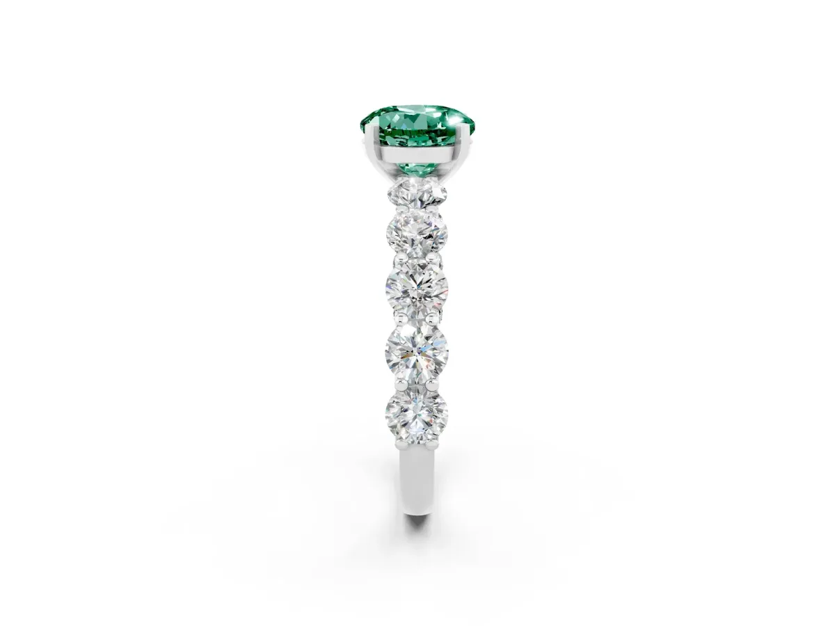 Round Cut Green Sapphire Prong Setting with Side Stones on a Pave Band Silver