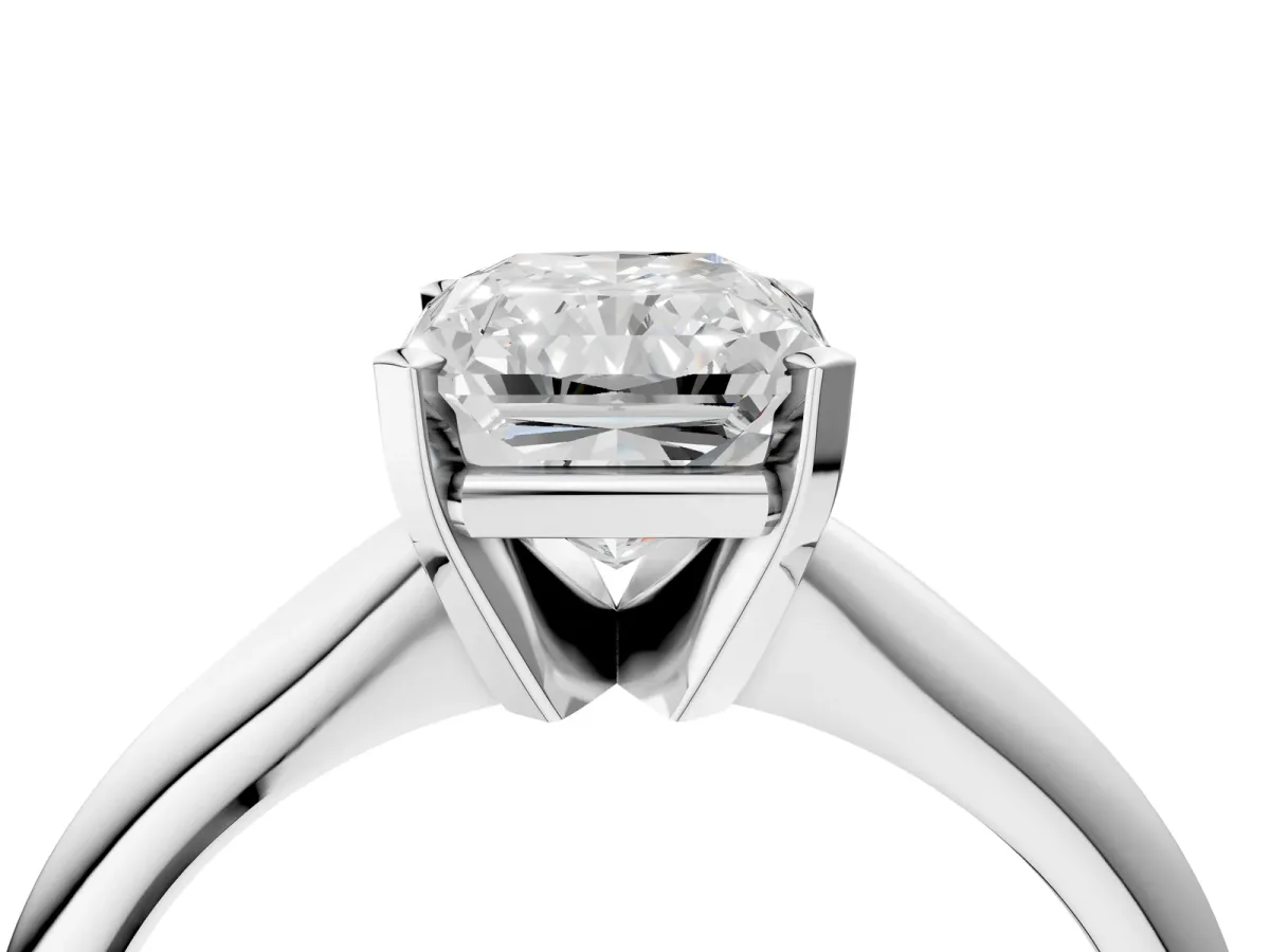 Radiant Cut Cut Solitaire Ring with Four-Prong Setting on a Classic Band Platinum