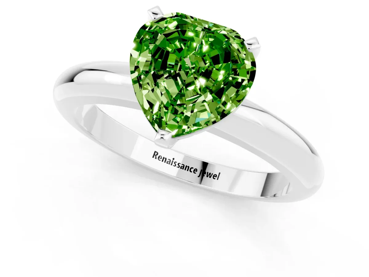 Heart Cut Peridot Solitaire Engagement Ring with Round Band and Four-Prong Setting Silver