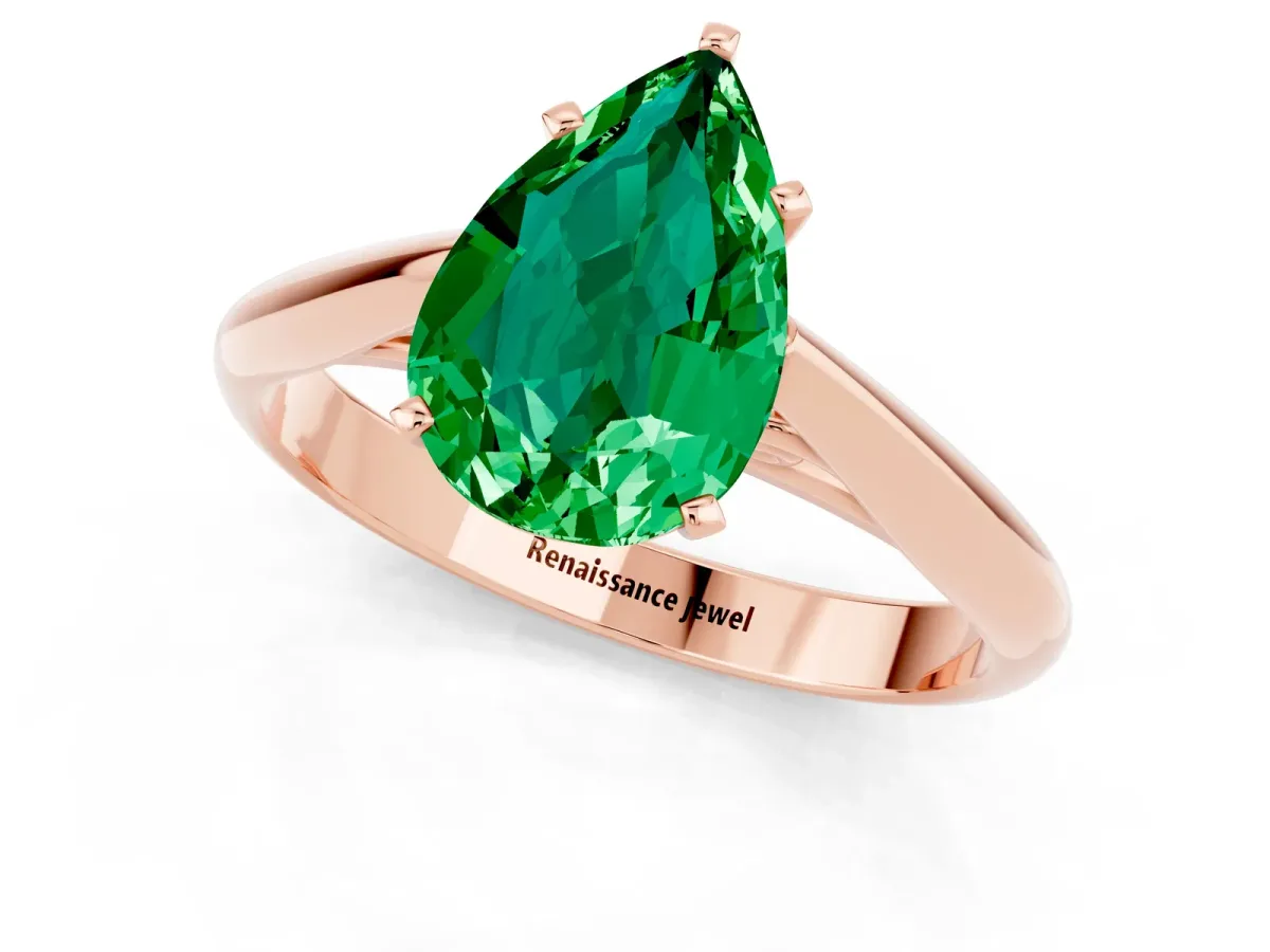 Pear Cut Emerald Solitaire Engagement Ring with Cathedral Setting and Four-Prong Mount Rose gold